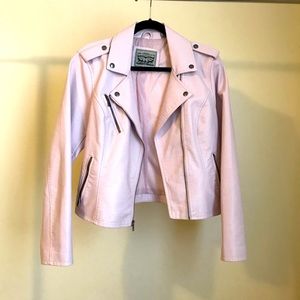 An off pink Levi’s leather jacket. Size is M